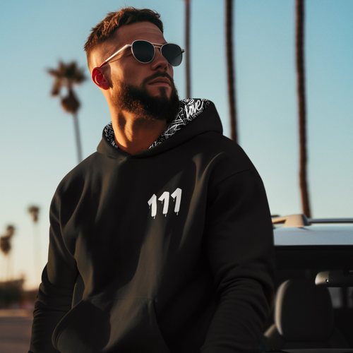 Black hoodie with 111 Angel Number design from Angel Numbers Merch Official, symbolizing new beginnings & manifestation.